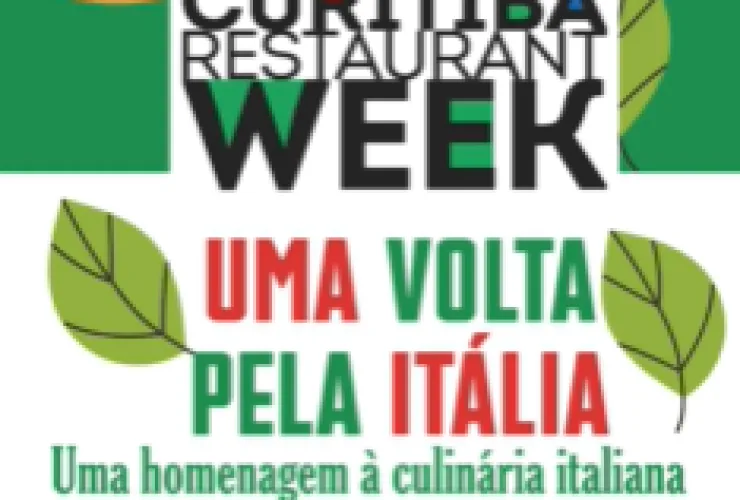 Prato de massa italiana servido em restaurante participante da Curitiba Restaurant Week, com taça de vinho ao fundo.